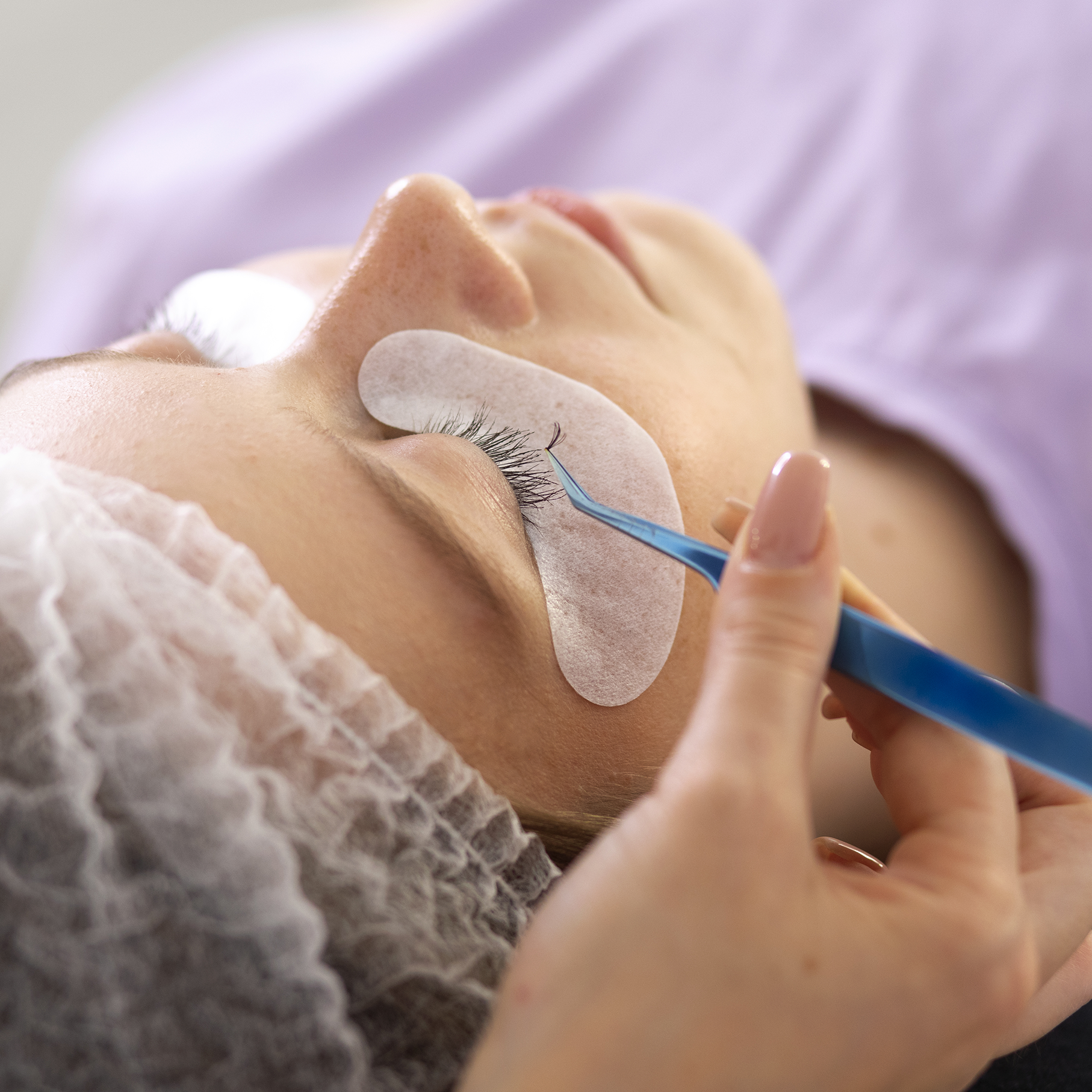 high-angle-hand-holding-tweezers